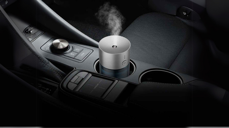 Car diffuser providing a refreshing and relaxing fragrance inside the vehicle with natural essential oils, perfect for travel or commuting.